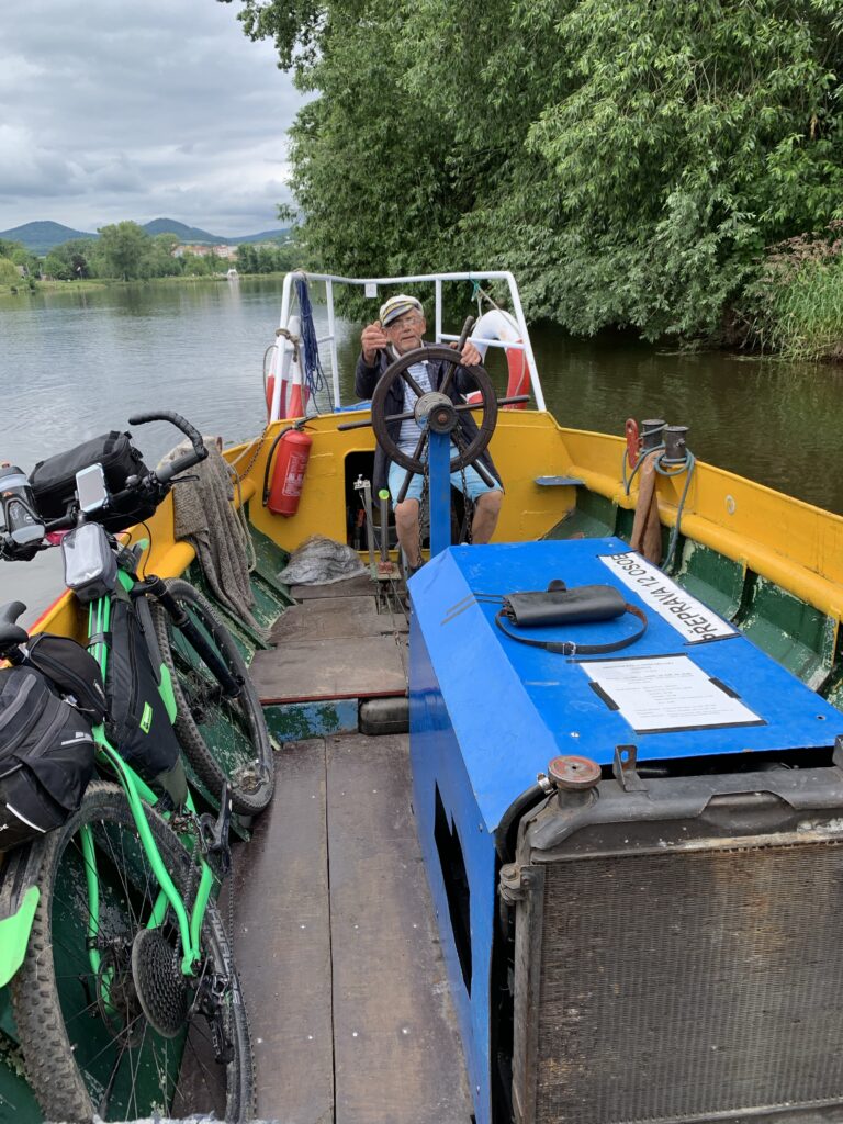 A tiny ferry boat for tourist and cyclists to Lovosice